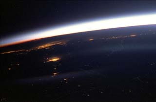 Earth limb – city lights at night.